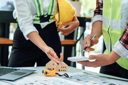 engineer-working-at-a-blueprint-of-house-in-office-2026-01-07-02-26-10-utc